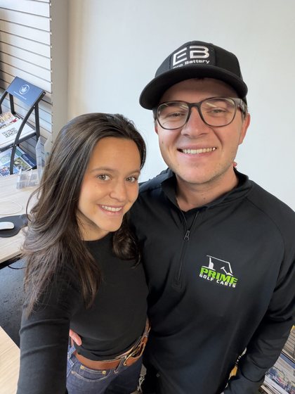 Michael Lambert, founder and CEO of Prime Golf Carts, with his wife